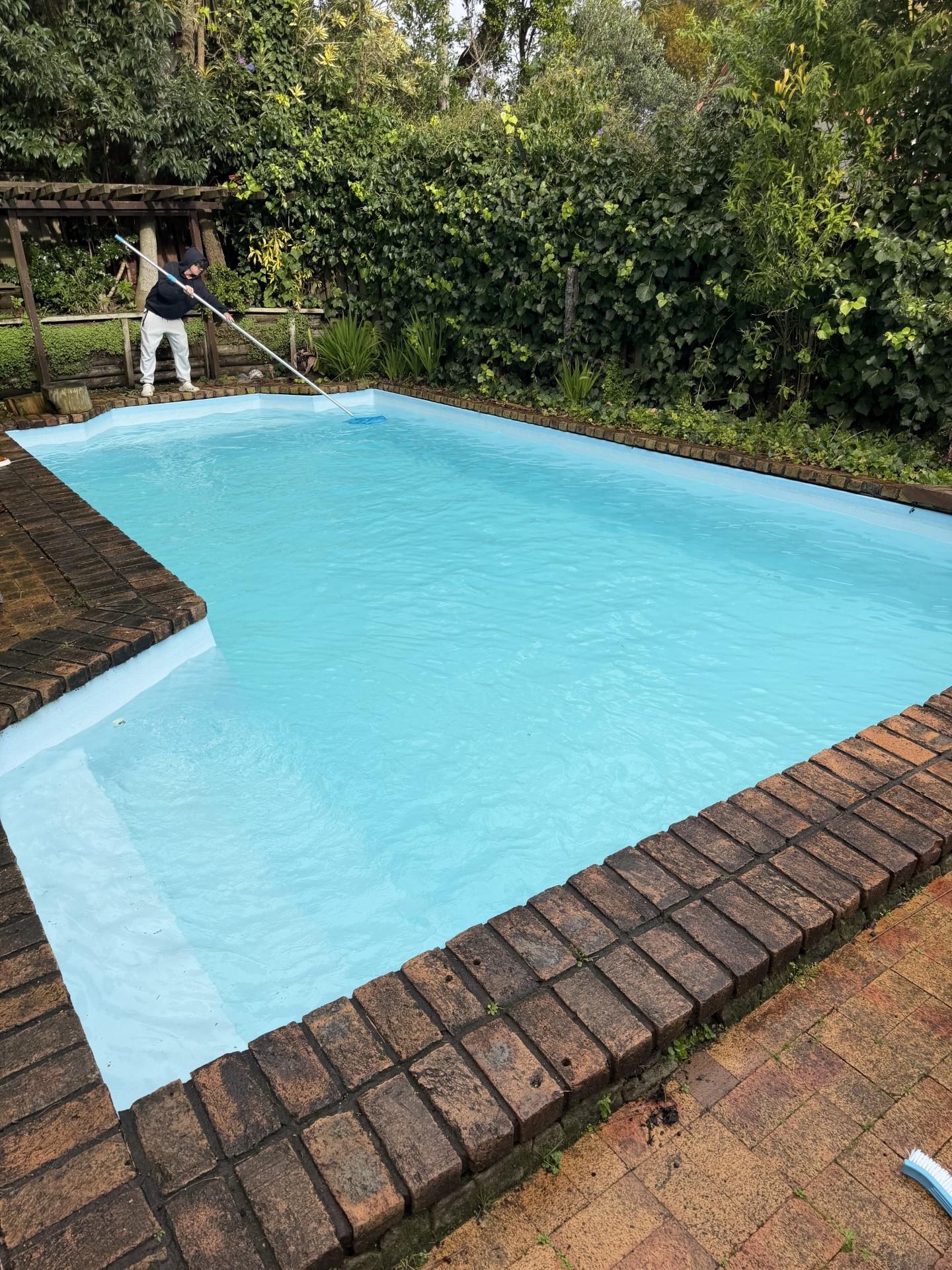 Same swimming pool with crystal clear blue water after Opulent Pools' green pool recovery